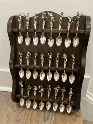 Lot Of 24 Disney 1988 NE Collector Silver Plates Spoons With Spoon Holder.