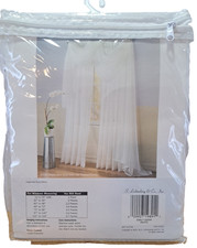 Emily Sheer Voile Rod Pocket Curtain Panel in white.