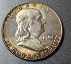 Franklin Half Dollar   1961-D    Choice BU Nice  Gold Toning on the Obverse