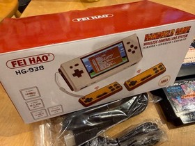 Famicom compatible portable console HG-938 with classic games
