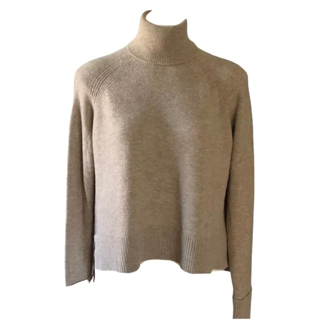 turtleneck sweater with side slits