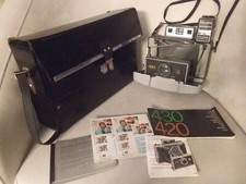 Polaroid Land Camera 420, with accessories, flash, case and more