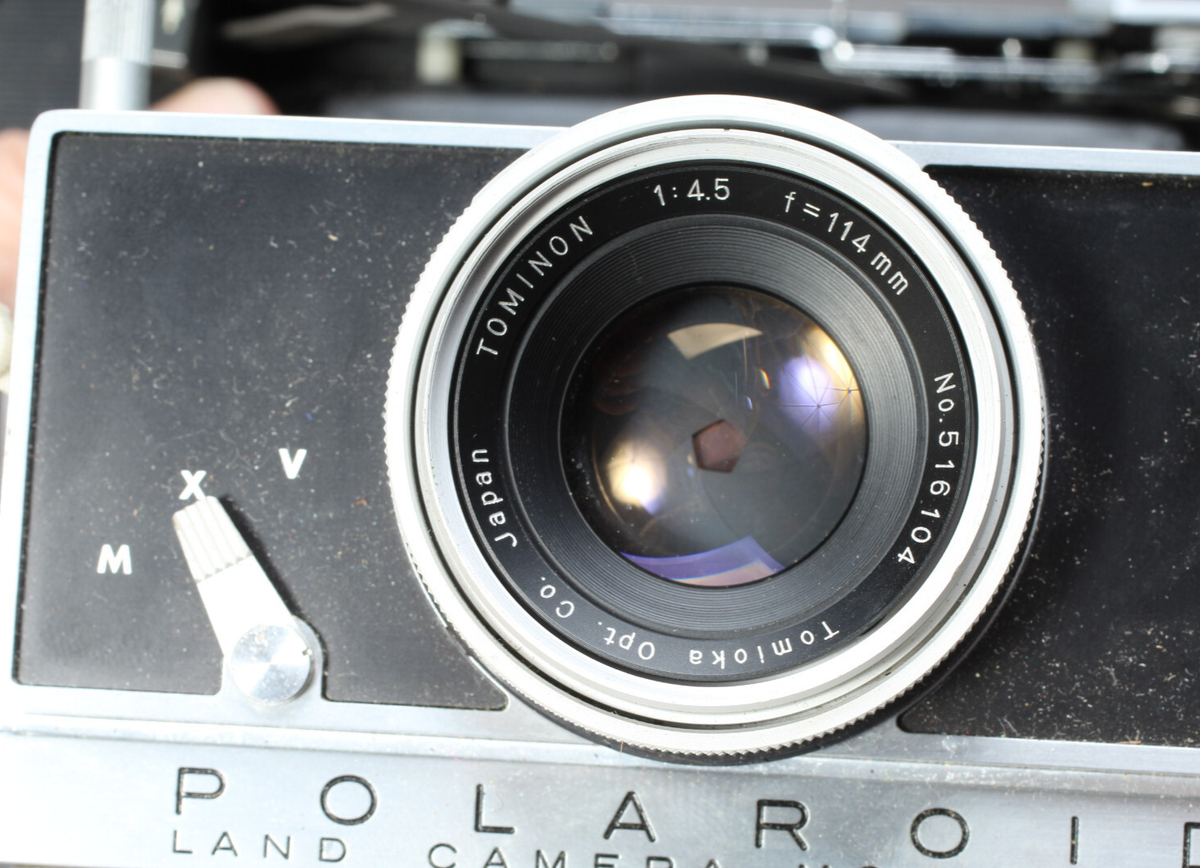 POLAROID LAND CAMERA 180 W 114MM TOMINON LENS FOR PARTS OR REPAIR