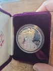 1986 S AMERICAN EAGLE ONE OUNCE SILVER LIBERTY DOLLAR, INCLUDES BOX & COA