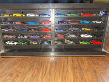Hot Wheels display with 39 hot wheels/mattel included