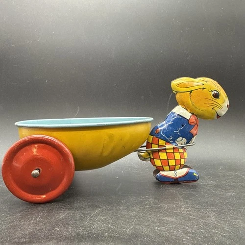 VINTAGE J. CHEIN TIN LITHO EASTER BUNNY PULLING EGG SHAPED CART toy