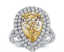 GIA Certified 5.00 CT Fancy Yellow Pear Shape Diamond set in Double Halo Setting