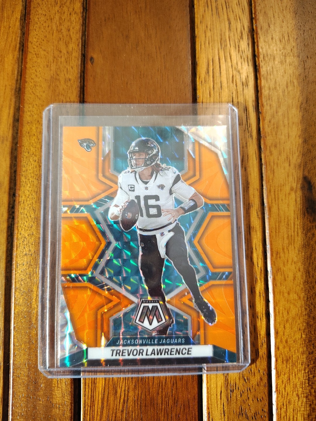 2022 Panini Mosaic Trevor Lawrence Jacksonville Jaguars Orange Reactive # 88