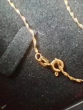 24" Solid 14KT Yellow Gold Twisted  Hain Necklace. Made In Italy Very Elegant.