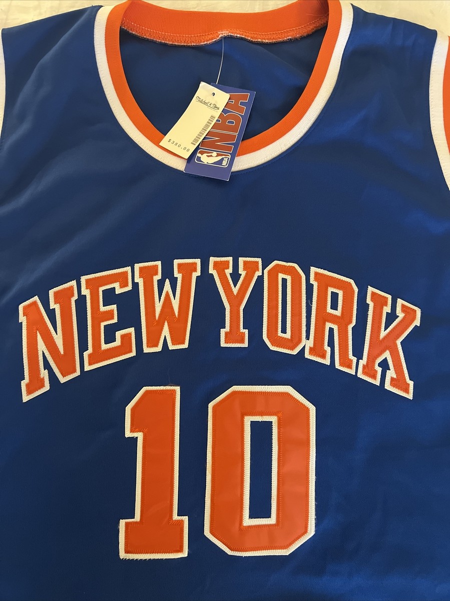 NBAユニフォーム　値下げ不可 HAKEEM OLAJUWON Champion TORONTO RAPTORS Purple Jersey 48 NBA