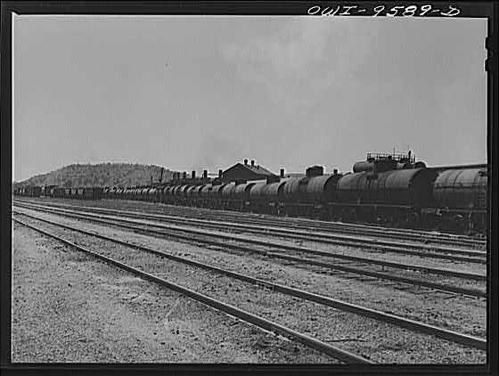 Photo:Tulsa, Oklahoma. Oil tank cars in the railroad yards]