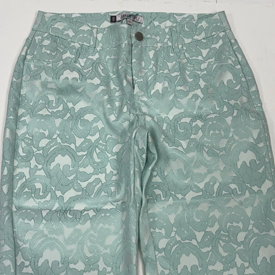 Pantalones capris Jennifer Lopez chinos cambray para mujer talla 2 verde azulado floral frente plano Foto 3 de 4