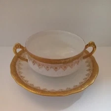 Limoges Strawbridge & Clothier Gold And Porcelain Colored Teacup And Saucer