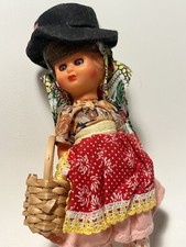 girl in folk dress with flowers