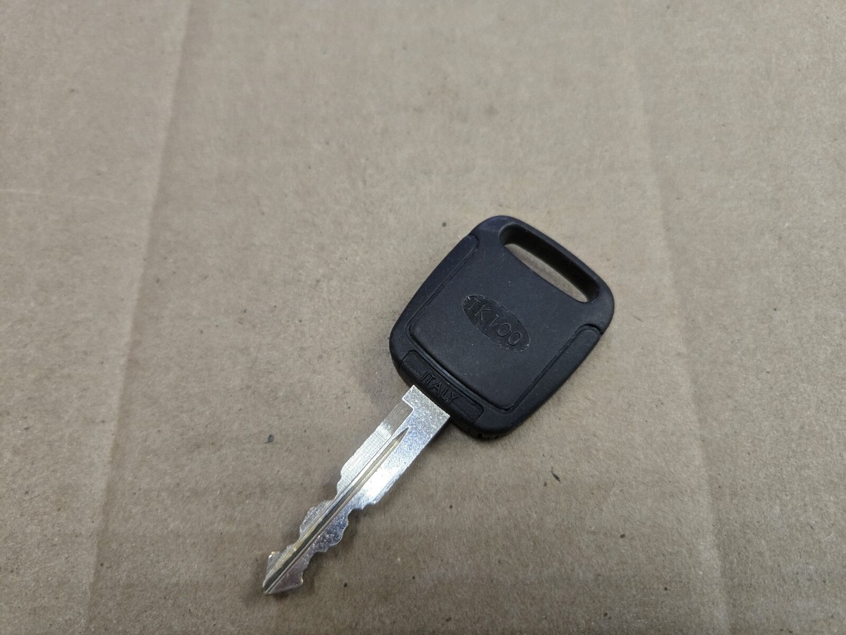 Aftermarket Factory Black & Chrome Ignition Door Key FD21U TK100