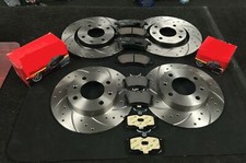 PERFORMANCE FRONT REAR DRILLED AND CURVED GROOVED BRAKE DISCS AND BRAKE PADS SET
