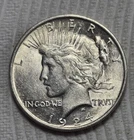 1924 P Peace Silver Dollar. Estimated Almost Uncirculated 58. A0519