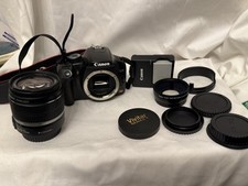 Canon EOS Rebel XSi Camera w/ Case,Charger, Batteries, lense included read