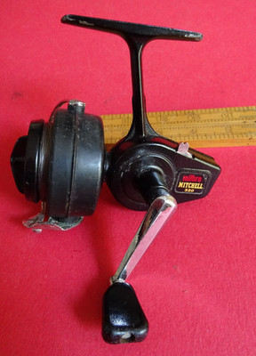 A SCARCE USED VINTAGE MILBRO MITCHELL 320 SPINNING REEL