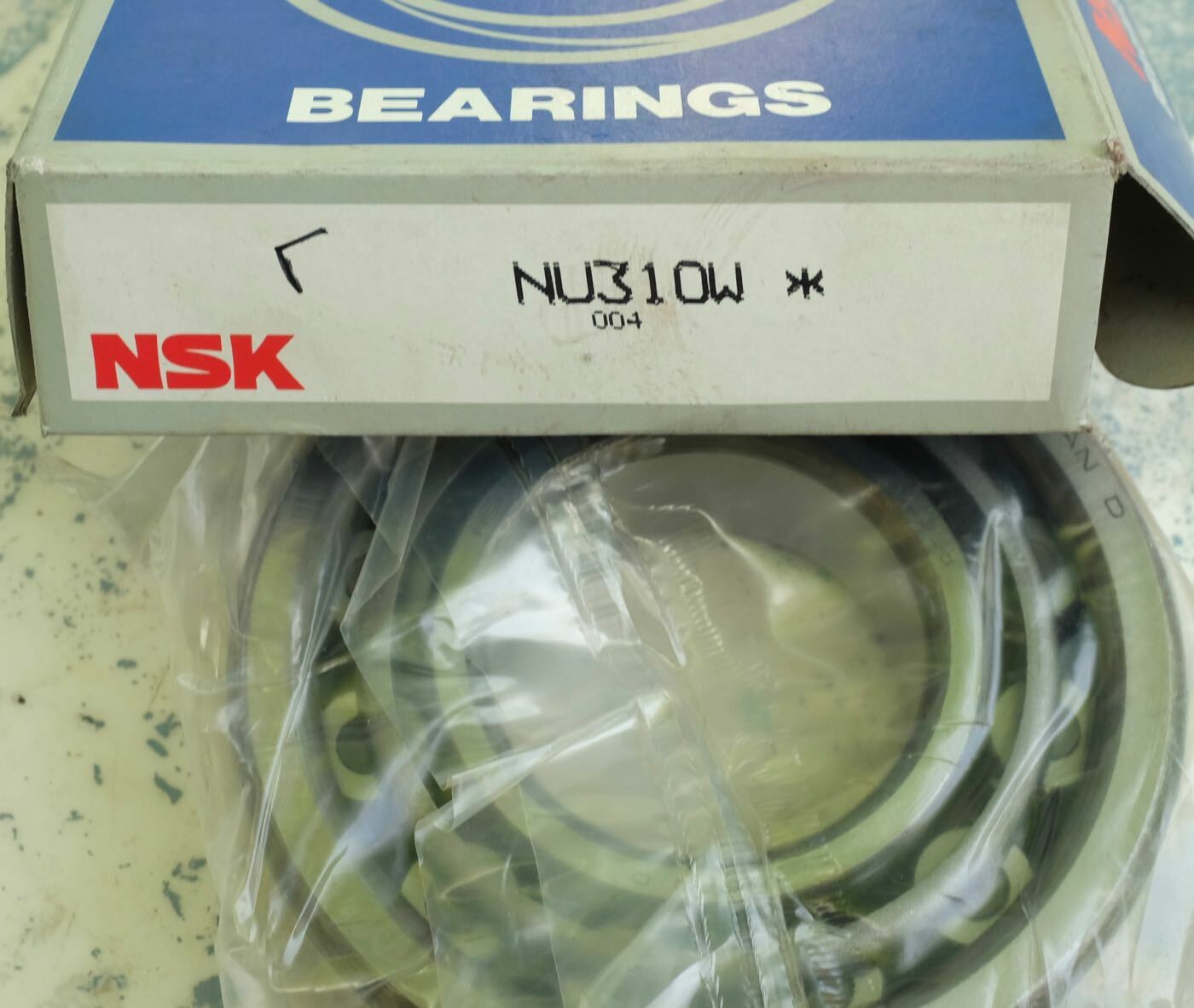 Éliminer les vibrations avec le roulement NSK NU310 W robuste