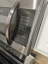 Frigidaire over the range  microwave gently used, fully functional