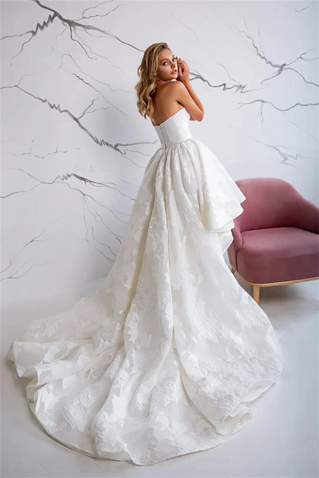 Vestidos de novia vintage sin mangas con apliques de encaje de playa altos bajos Foto 2 de 4