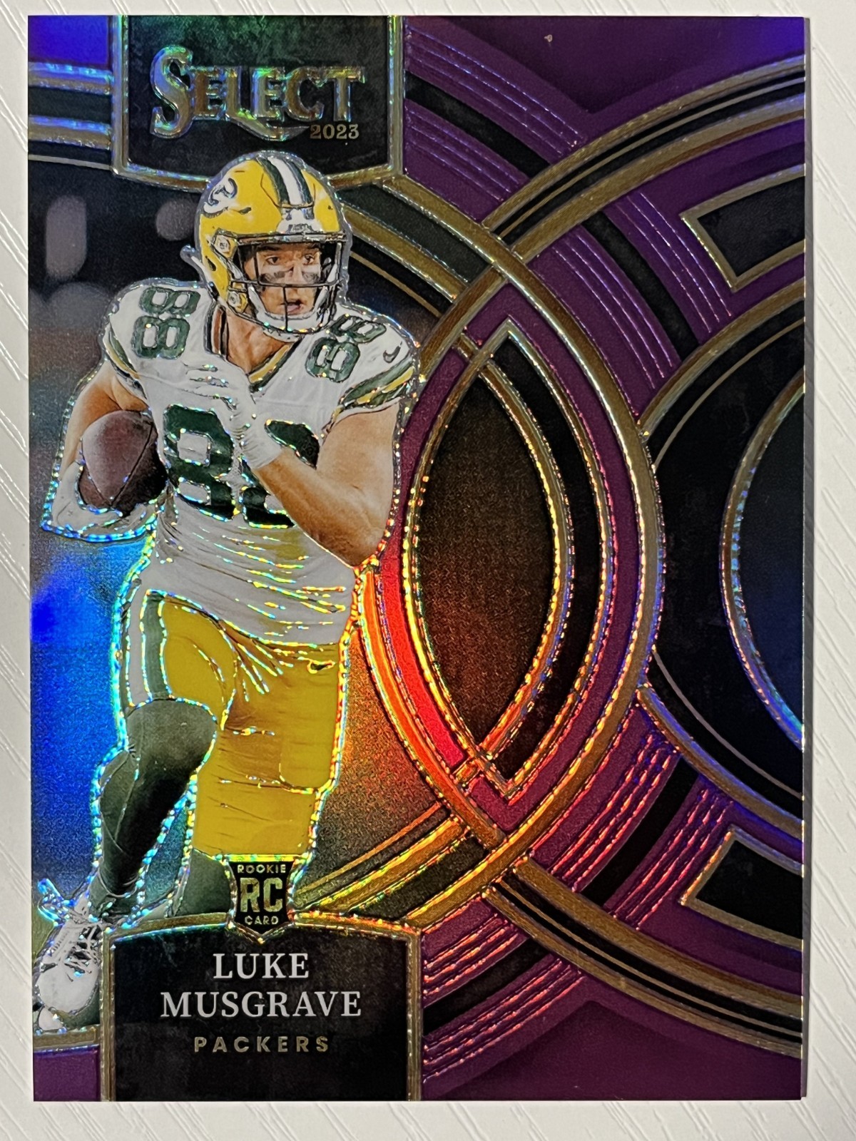 Luke Musgrave 2023 Panini Select Premier Level Purple Prizm RC 52/75 Packers