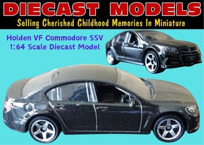 BLACK HOLDEN VF COMMODORE SSV, MATCHBOX-DRUCKGUSSMODELL IM MASSSTAB 1:64; NEU AUF KARTE