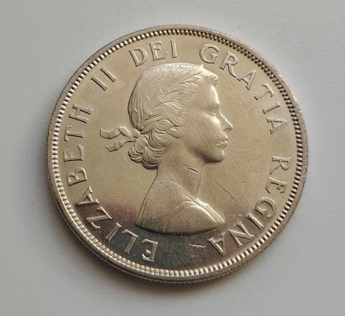 1959 CANADIAN EXPLORER ONE DOLLAR SILVER COIN-VF DETAILS-AU-80% SILVER-NICE