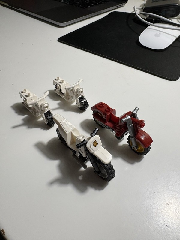 4 Lego Motorcycles One Red, Three White And One Lego City Police Motorcycle