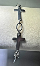 Polished stainless steel sideways crosses bracelet. 6.69g L- 7 in