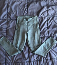 ATHLETA 7/8 leggings XS GREEN WITH POCKETS
