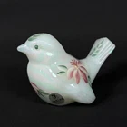 Fenton Handpainted Iridescent Glass Bird Figurine by(who is)
