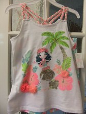 Matching set of white top with sparkle detail/shorts and bobble.age 7-8 years.