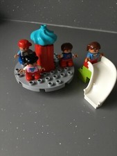 Lego Duplo Roundabout, slide and minifigures.