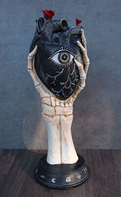 Gothic Alchemy Skeleton Hand Holding Black Anatomy Heart With Evil Eye Figurine