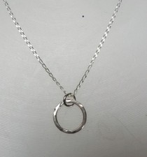 Cute sterling silver handmade karma , friendship circle necklace.