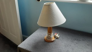 BHS LIGHT WOOD PEDESTAL BASE TABLE LAMP & CREAM MATERIAL SHADE