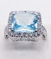 Solid 925 sterling silver simulated blue topaz and cubic zirconia cocktail ring