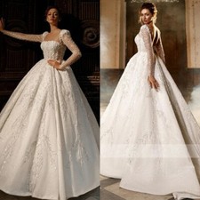 Elegant A-Line Wedding Dresses Boat Neck Long Sleeved Satin Applique Bridal Gown