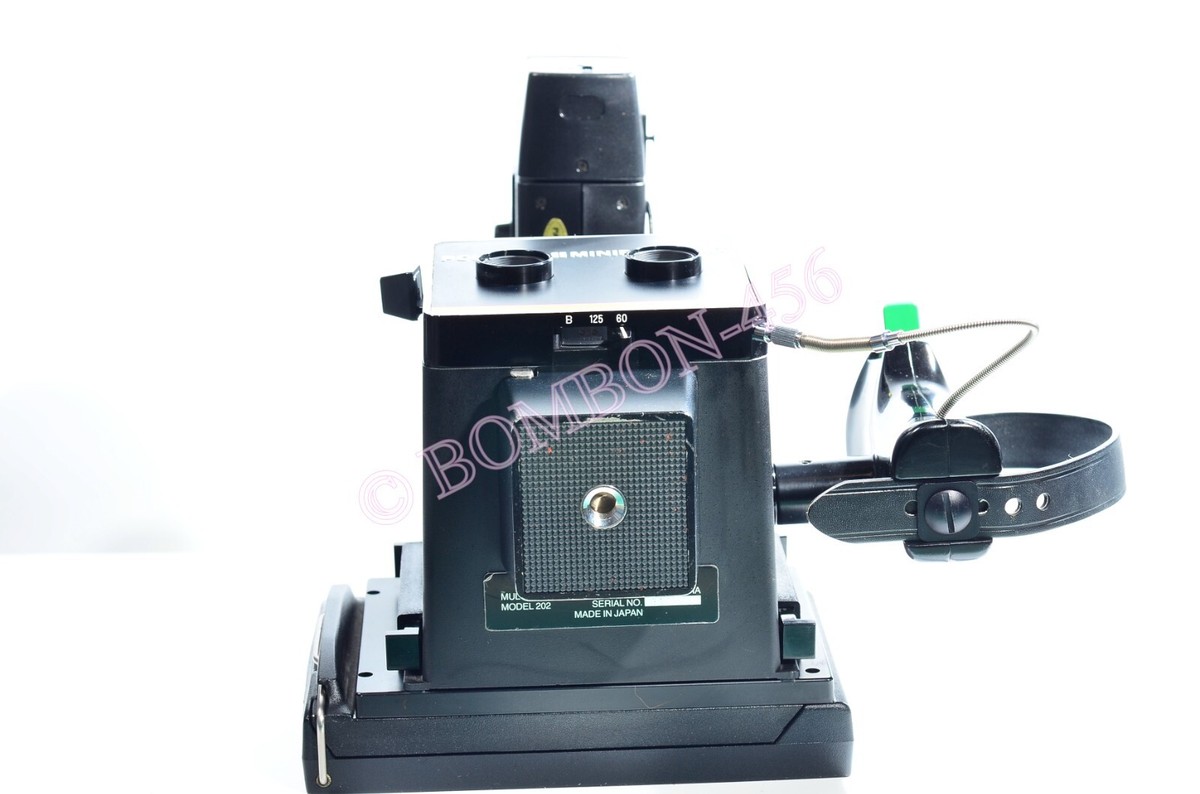 POLAROID MINIPORTRAIT CAMERA M-202. TESTED- GUARANTEED. WITH BACK