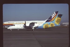 Orig 35mm airline slide Air Nippon Network DHC-8-315 JA802K