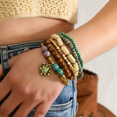 Ensemble de Bracelets Fantaisie Acier Doré, perles et pampilles ethniques - Photo 1/2