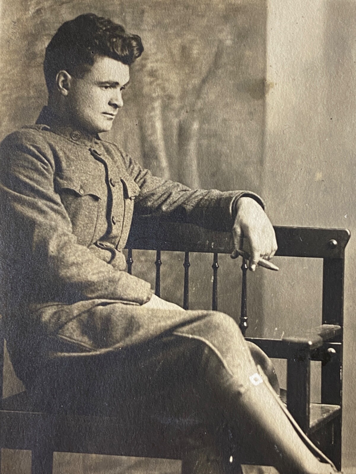 1917 WWI Soldier Smoking Cigarette in Chair Antique Real Photo Postcard RPPC