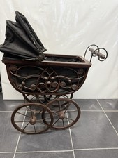 Middle of 20th century vintage dolls Brown Wicker pram With Hoodie