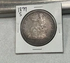 1877 S TRADE DOLLAR. RAW, UNCERTIFIED, CIRCULATED. BETTER GRADE.