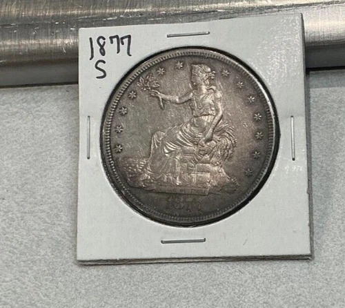 1877 S TRADE DOLLAR. RAW, UNCERTIFIED, CIRCULATED. BETTER GRADE.