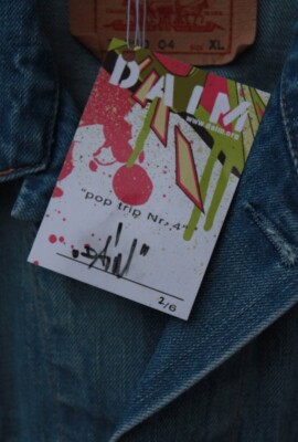 Graffiti Kunst auf Levis Jeansjacke von DAIM (Mirko Reisser)
