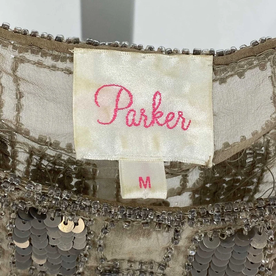 Blusa Parker de seda gris y dorada | Cuello redondo y mangas de ala de murciélago Foto 3 de 4