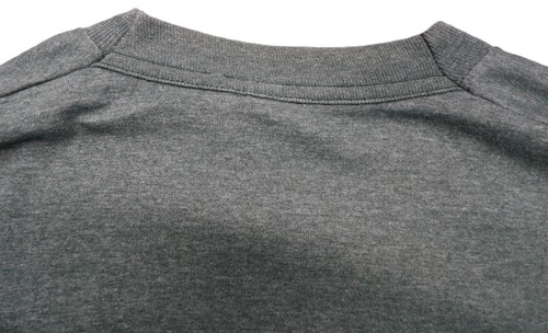 Gray VTG men’s shirt XLT with tall 80s pocket and single stitch detail on collar, shown from the back on a white surface.